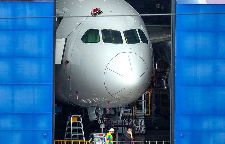 A new Boeing 787 Dreamliner emerges from the 787 final assembly factory in Everett on July 24, 2020. Production of the Dreamliner and the jobs it represents is leaving for Charleston this spring. Photographed on July 24, 2020.
214572