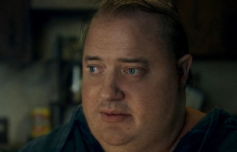 Brendan Fraser plays Charlie, who never leaves his apartment and is trying to make amends to his angry teenage daughter, in “The Whale.” (A24).