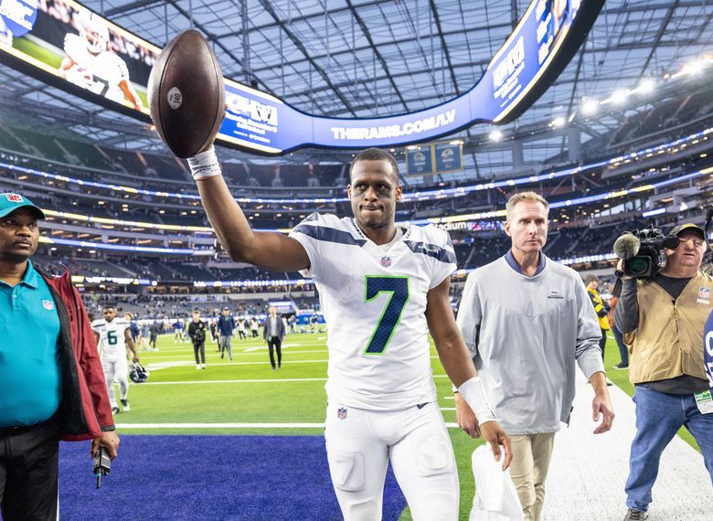 Geno Smith comes off the field following Sunday’s 27-23 win over the LA Rams. (Dean Rutz / The Seattle Times)