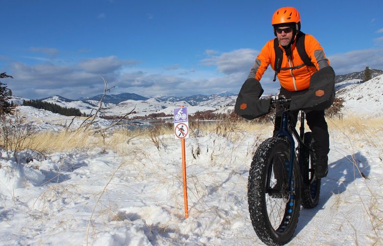 Methow Fatbike’s Dave Acheson describes fatbiking as like riding “a big, slow mountain bike” as he cruises down a dedicated fatbike trail in Pearrygin Lake State Park outside Winthrop.