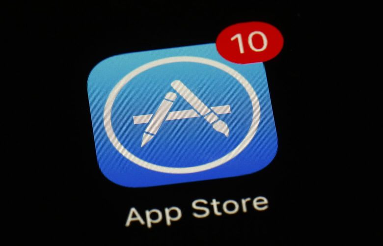 FILE – This March 19, 2018, file photo shows Apple’s App Store app. At a time of rising inflation, Apple is introducing 600 options that could free developers from the days of charging 99 cents. ((AP Photo/Patrick Semansky, File)