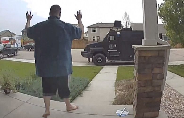 In this image from video provided by Leslie Bowman, Anderson Lee Aldrich surrenders to police at a home where his mother, Laura Voepel, was renting a room in Colorado Springs, Colo., on June 18, 2021. According to sealed law enforcement documents verified by The Associated Press, Aldrich’s actions brought SWAT teams and the bomb squad to the normally quiet neighborhood, forced the grandparents to flee for their lives and prompted the evacuation of 10 nearby homes to escape a possible bomb blast. (Leslie Bowman via AP) NY956 NY956