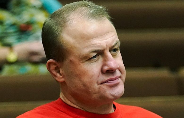 Initiative promoter Tim Eyman listens during a session of Thurston County Superior Court, Wednesday, Feb. 10, 2021, in Olympia, Wash. Eyman, who ran initiative campaigns across Washington for decades, will no longer be allowed to have any financial control over political committees, under a ruling from Superior Court Judge James Dixon Wednesday that blasted Eyman for using donor’s contributions to line his own pocket. Eyman was also told to pay more than $2.5 million in penalties. (AP Photo/Ted S. Warren) WATW104 WATW104