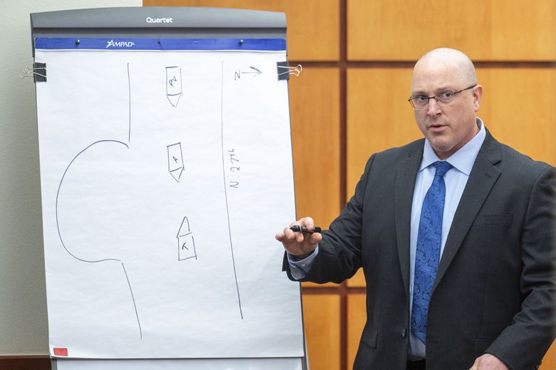 During testimony in Pierce County Superior Court on Wednesday, Tacoma Police Department Detective Chad Lawless diagrams  the scene where he and partner officer Corey Ventura responded to Pierce County Sheriff Ed Troyer’s encounter with newspaper carrier Sedrick Altheimer on Jan. 27, 2021.
(Pete Caster / The News Tribune)