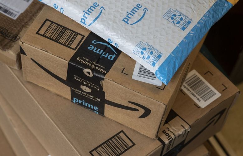 Amazon boxes during a delivery in New York, U.S., on Tuesday, Oct. 13, 2020. (Victor J. Blue/Bloomberg)