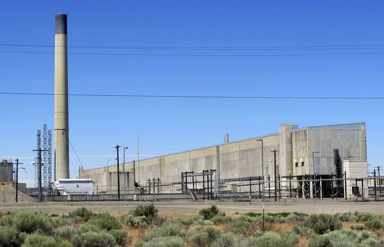 FILE – This May 13, 2017 file photo shows a portion of the Plutonium Finishing Plant on the Hanford Nuclear Reservation near Richland, Wash. The state of Washington said Tuesday, Jan. 8, 2019 that it opposes a federal proposal to reclassify as less dangerous some radioactive waste stored in underground tanks at the site. State officials said Tuesday they fear the change will allow the federal government to walk away from its obligation to clean up millions of gallons of radioactive waste. (AP Photo/Nicholas K. Geranios, File) LA212