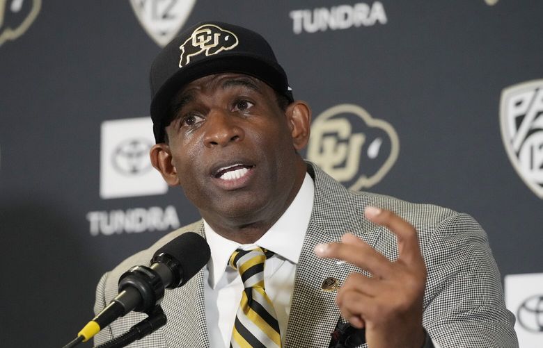 Deion Sanders speaks after being introduced as the new head football coach at the University of Colorado during a news conference Sunday, Dec. 4, 2022, in Boulder, Colo. Sanders left Jackson State University after three seasons at the helm of the school’s football team. (AP Photo/David Zalubowski) OTKDZ147 OTKDZ147