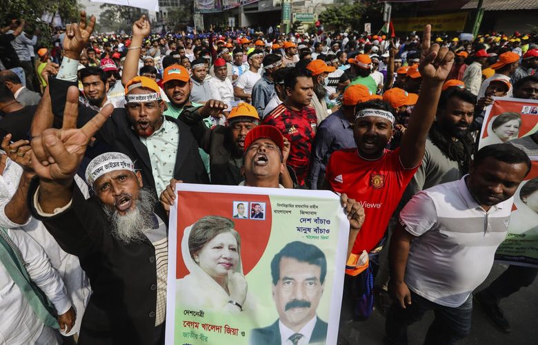 Supporters of Bangladesh Nationalist Party, headed by former Prime Minister Khaleda Zia, shout slogans during a rally in Dhaka, Bangladesh, Saturday, Dec. 10, 2022. Tens of thousands of opposition supporters rallied in Bangladesh’s capital on Saturday to demand the government of Prime Minister Sheikh Hasina resign and install a caretaker before next general elections expected to be held in early 2024. (AP Photo/Mahmud Hossain Opu) DHA103 DHA103