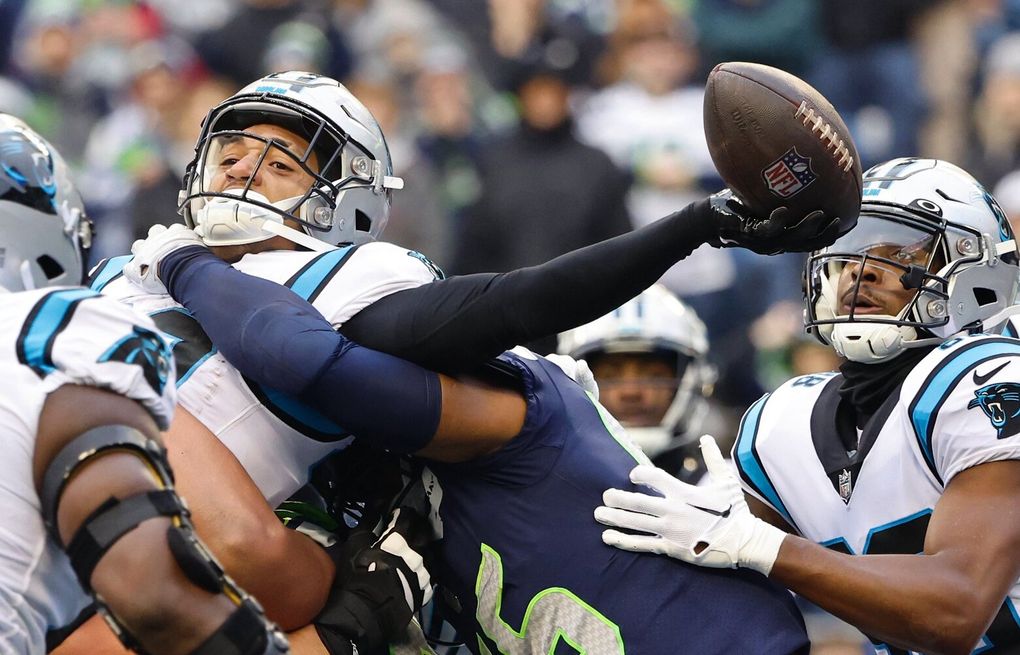 Panthers run over and through Seahawks for 30-24 victory