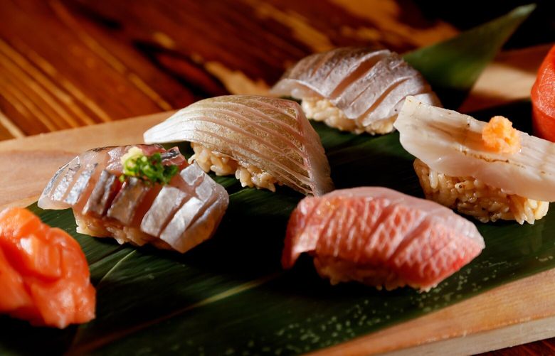 A chef’s choice of sushi at Tsukushinbo: from left top row, Ora king salmon, horse mackerel, striped jack and barracuda. Bottom row from left, goldeneye snapper and beltfish. 222389