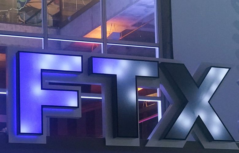 FILE – The FTX Arena logo is seen where the Miami Heat basketball team plays on Nov. 12, 2022, in Miami. (AP Photo/Marta Lavandier, File)