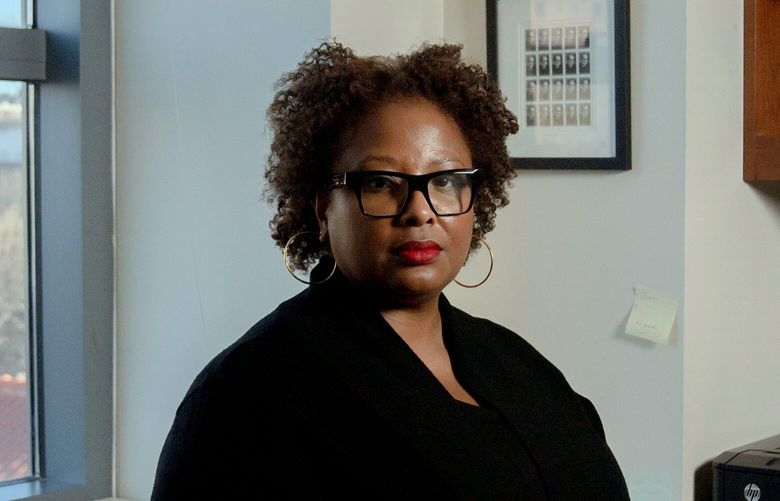 Deborah Archer, the director of the Center on Race, Inequality and the Law at the NYU School of Law, at her office in New York on Tuesday, Dec. 13, 2022. Archer is the lead researcher on a study that is the basis of a lawsuit against State Farm. ( Amir Hamja/The New York Times)