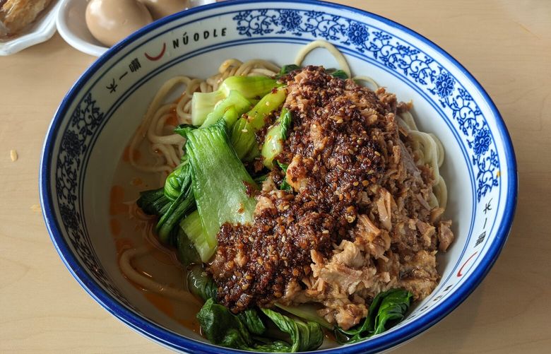 The real sleeper hit of a dish at Bellevue’s Nuodle is the stewed pork with handmade noodles, topped with a mouth-numbing chili sauce and incredibly tender pork.