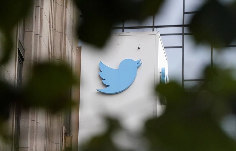 FILE – A sign at Twitter headquarters is shown in San Francisco, Thursday, Dec. 8, 2022. Twitter has suspended an account that used publicly available flight data to track Elon Musk’s private jet, despite a pledge by the social media platform’s new owner to keep it up because of his free speech principles. (AP Photo/Jeff Chiu, File) NYSS303 NYSS303