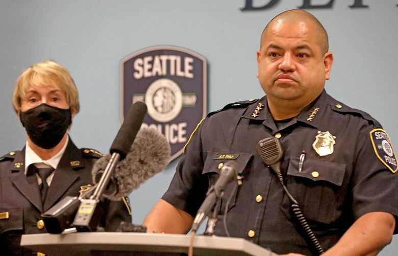 SPD interim Chief Adrian Diaz conducts a press conference Monday, October 19, 2020. At left is Assistant Chief of Criminal Investigations Deanna Nollette. 215431