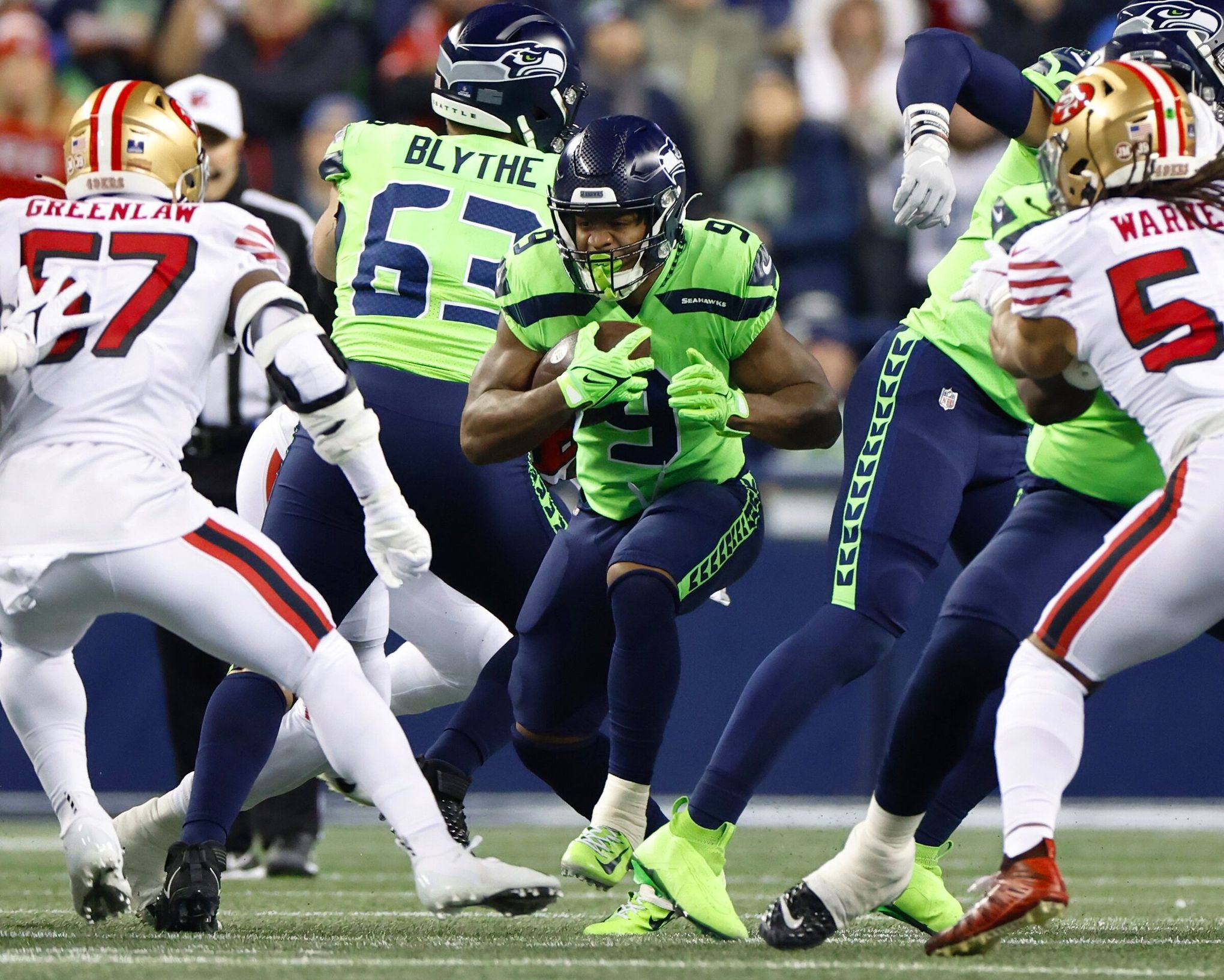 Seattle Seahawks running back Kenneth Walker III (9) runs out on to the  field before an NFL football game against the Los Angeles Rams, Sunday,  Sept. 10, 2023 in Seattle. The Rams