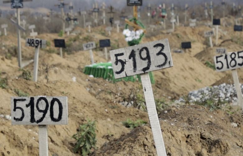 This Nov. 16, 2022 image from video shows some of the new graves which have been dug since the Russian siege began, at the Staryi Krym cemetery on the outskirts of the occupied Ukrainian city of Mariupol. Most are marked only by number. The Associated Press estimated at least 10,300 new graves in and around Mariupol — 8,500 in this cemetery — by analyzing satellite imagery from early March through December, noting sections where the earth had been disturbed. (AP Photo) NY467 NY467