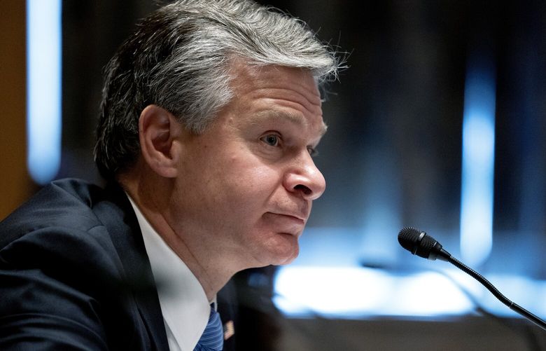 FILE — Christopher Wray, director of the Federal Bureau of Investigation, during a Senate Homeland Security Committee hearing at the Dirksen Senate Office building in Washington, Sept. 21, 2021. Republicans are seeking to undermine the bureau with accusations of political bias just as it has assumed the lead in an array of investigations of former President Donald Trump. (Stefani Reynolds/The New York Times) XNYT83 XNYT83