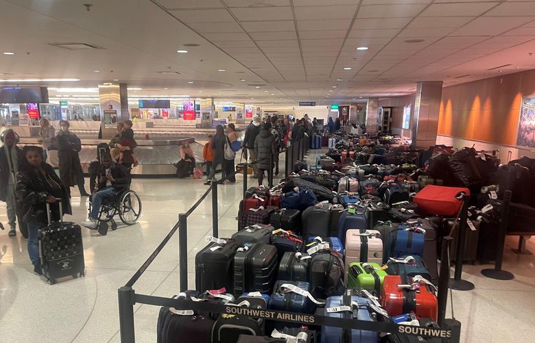 Luggage from Southwest Airlines passengers at Baltimore/Washington International Marshall Airport on Tuesday. Washington Post photo by Marvin Joseph.