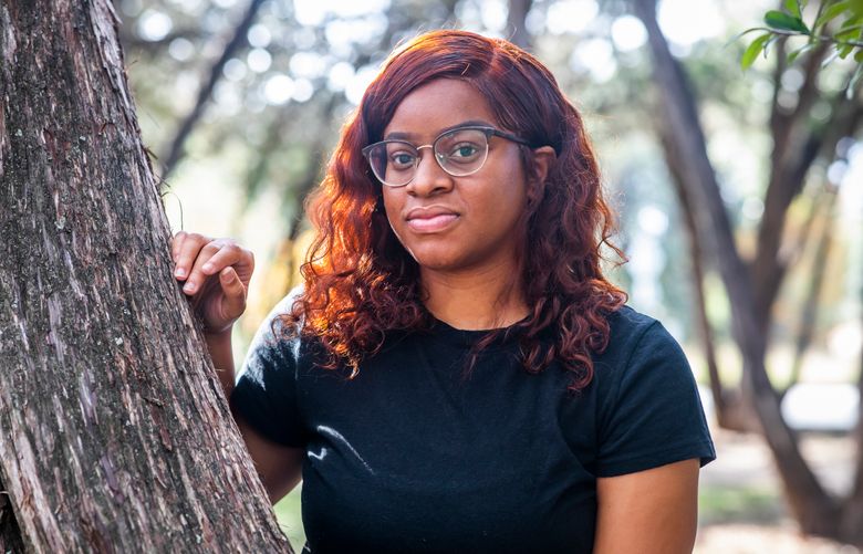 Alexis Carr, a University of Texas at Austin graduate, in Austin, Texas, Nov. 29, 2022. Carr is looking for her first full-time job, focusing on mental health nonprofits, and saving up by working as a server at an Italian restaurant. (Drew Anthony Smith/The New York Times)