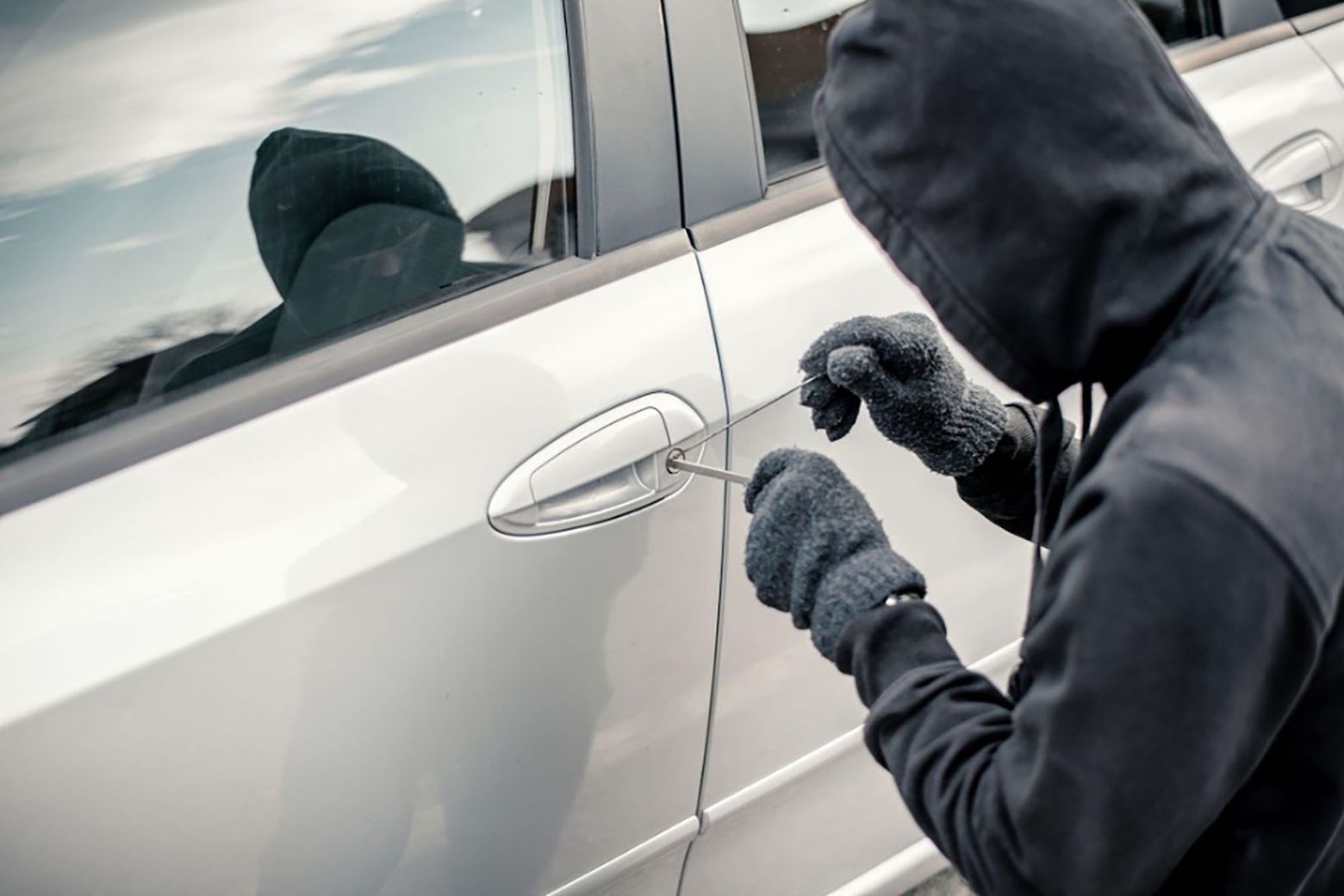 Coins in Car Door Theft Warning