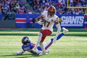 Giants tie Commanders after blowing lead late in fourth