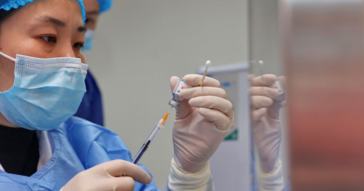 China races to vaccinate elderly, but many are reluctant