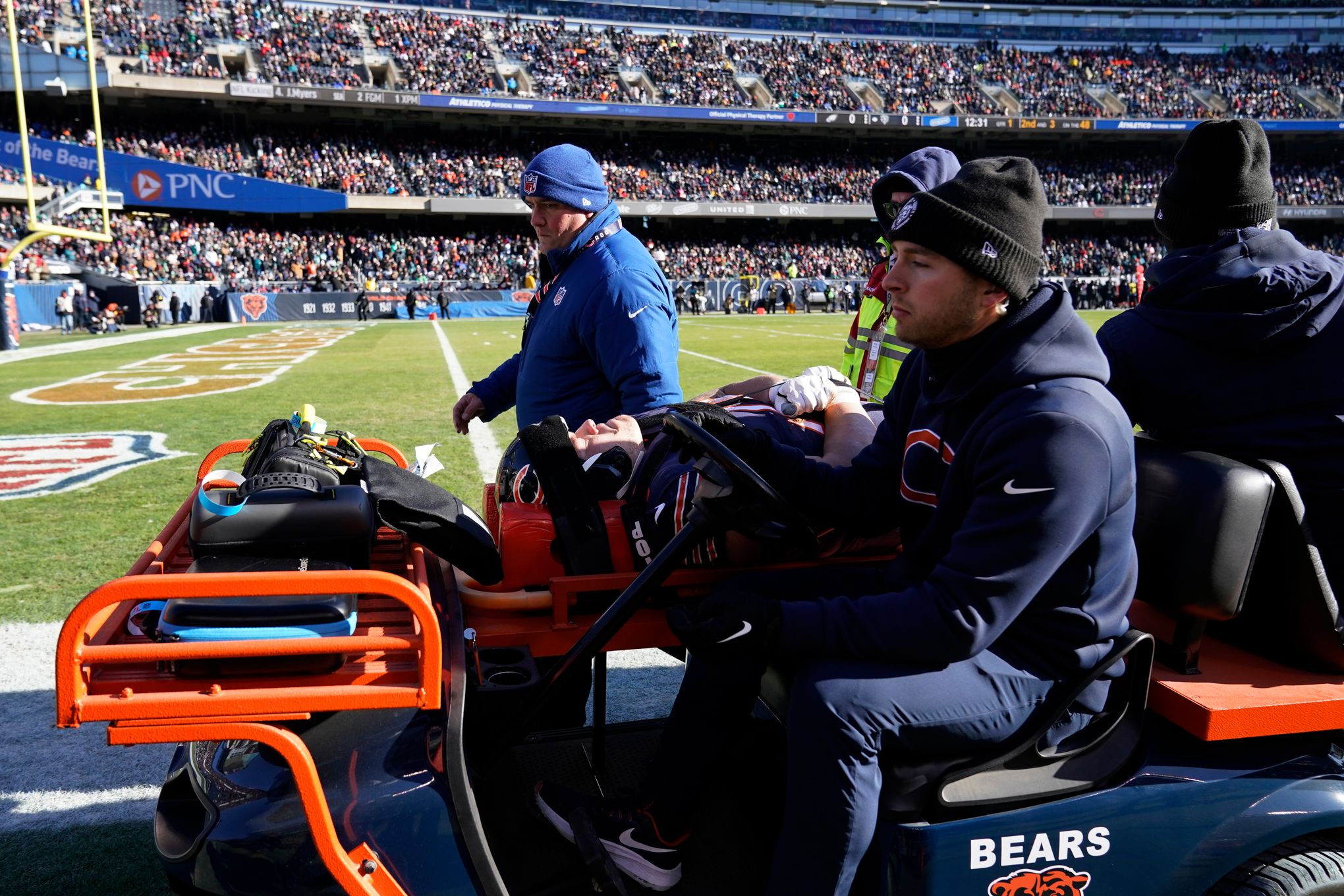 Chicago Bears offensive tackle Teven Jenkins (76) runs off the