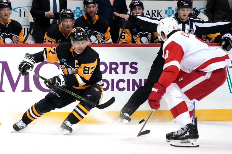 Walman scores in OT to lift Red Wings past Penguins
