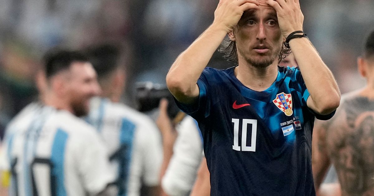 Class act' Luka Modric takes selfie with Morocco staff after World Cup  play-off win, as star hailed as 'impossible to replace' as he bows out of  tournament