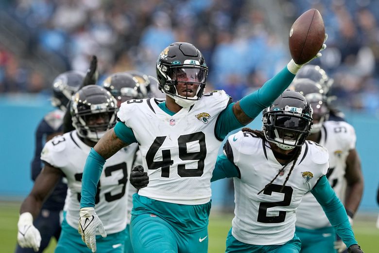 Lawrence throws 3 TDs, Jags end skid in beating Titans 36-22