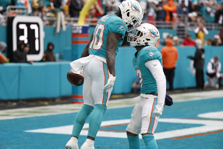 Miami Dolphins cling to playoff hopes after loss