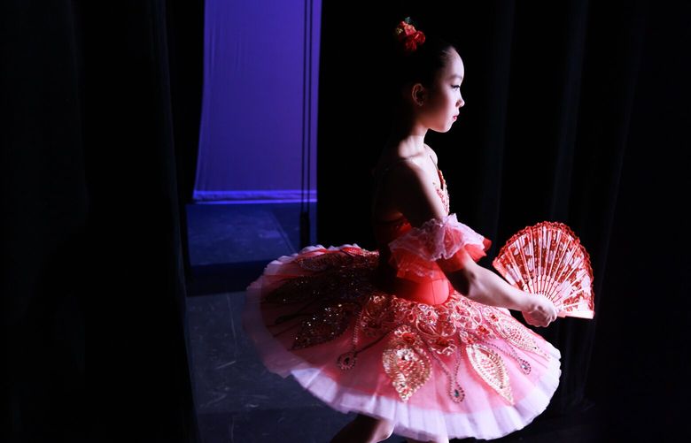 Emili Kobayashi, 14, of Sultanov Ballet Academy, waits to perform during the second day of the Youth America Grand Prix semi-finals, an international ballet competition, at Edmonds Center for the Arts in Edmonds, Wash. Friday, Jan. 6, 2023. 

Hundreds of dancers – between the ages of nine to 19 – will take workshops, classes and audition for finals in Tampa, Florida where dancers will perform and audition for scholarships. “The most promising dancers in the world will converge in Tampa, Florida for the finals,” says Sergey Gordeev, founding director of external affairs. “It’s the largest student ballet scholarship competition in the world.” The Youth America Grand Prix semi-finals are held in 30 locations in the United States, 15 international locations and is open to the public in Edmonds, Wash. until Jan 8. For more information, visit: www.yagp.org.
LO 222725