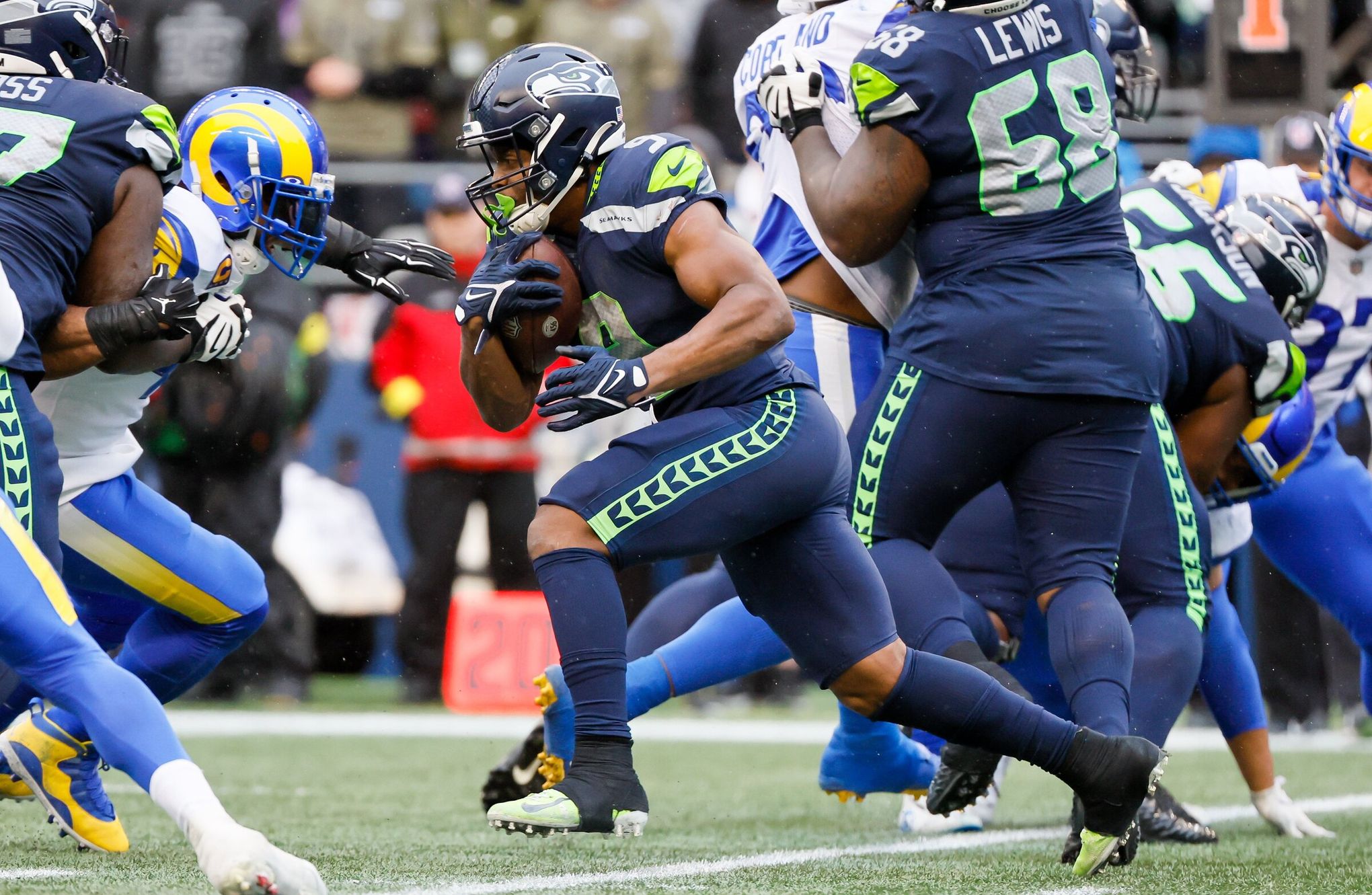 Seattle Seahawks running back Kenneth Walker III powers across the goal  line for a 1-yard TD