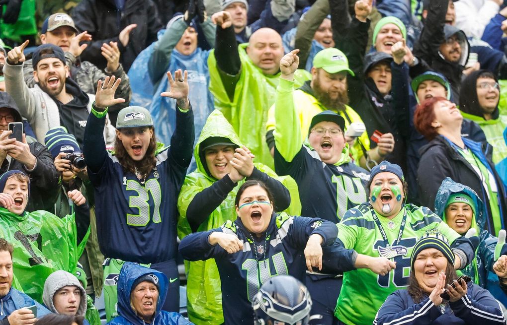 Seattle seahawks fans cheer during hi-res stock photography and