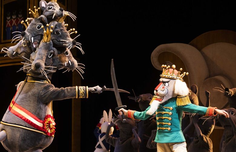 The Nutcracker fights the Mouse King during a dress rehearsal the Pacific Northwest Ballet’s production of George Balanchine’s The Nutcracker at McCaw Hall in Seattle on Nov. 23, 2022.