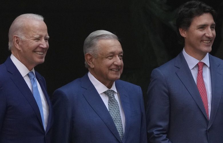 U.S. President Joe Biden, from left, Mexican President Andres Manuel Lopez Obrador and Canada’s Prime Minister Justin Trudeau, pose for an official photo during the North America Summit, at the National Palace in Mexico City, Tuesday, Jan. 10, 2023. (AP Photo/Fernando Llano) XFLL148 XFLL148