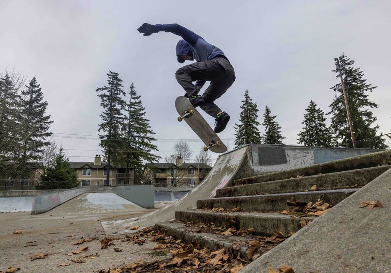 Gera Berhanu, 19, does a trick over the steps of the skatepark at Steel Lake Park Annex. Two Federal Way City Council members said there are plans to replace the city&#8217;s only skatepark when this one is demolished for the new maintenance facility. (Daniel Kim / The Seattle Times)