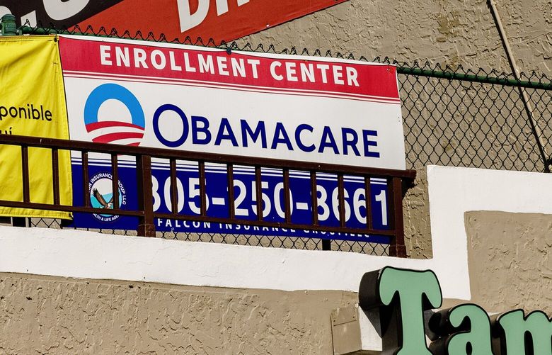 An insurance shop advertises Obamacare at a shopping center in Miami, Nov. 30, 2022. A decade after the Affordable Care Act’s federal health insurance marketplace was created, its outsize — and improbable — popularity in South Florida persists. (Scott McIntyre/The New York Times) XNYT77 XNYT77