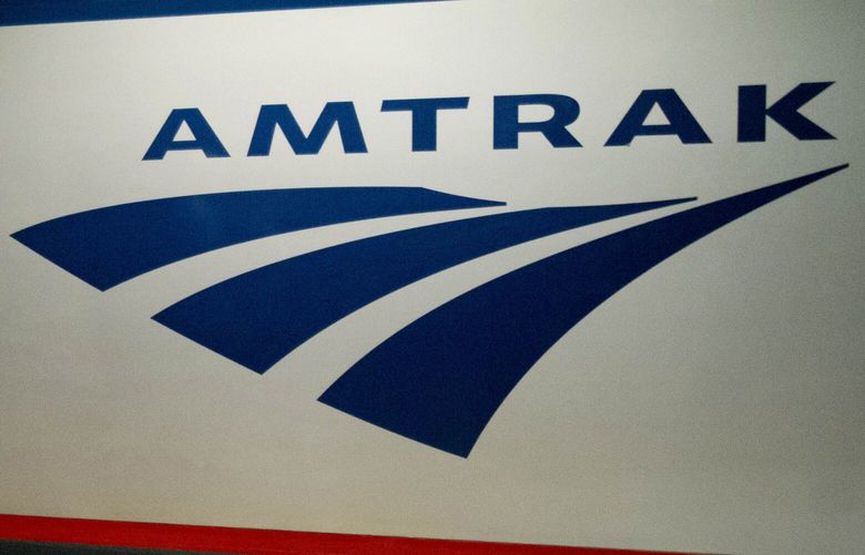 FILE – In this Feb. 6, 2014 file photo, an Amtrak logo is seen on a train at 30th Street Station in Philadelphia. A federal appeals court has once again ruled that Congress can’t give Amtrak power to impose rail standards on other private railroads. The U.S. Court of Appeals for the District of Columbia Circuit ruled Friday, April 29, 2016, it is unconstitutional to give a “self-interested” company regulatory power over competitors , even if Amtrak is a public-private hybrid. (AP Photo/Matt Rourke, File)