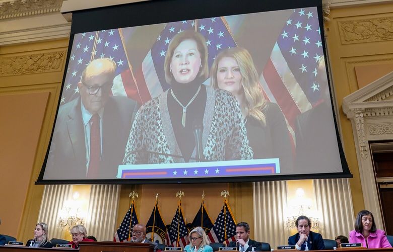 Lawyer Sidney Powell is seen via video as the House select committee investigating the Jan. 6, 2021, Capitol attack holds a public hearing on Capitol Hill on June 13. MUST CREDIT: Washington Post photo by Jabin Botsford