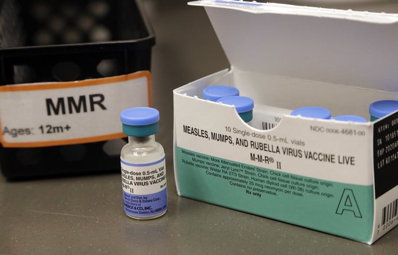 In this photo taken Wednesday, May 15, 2019, a dose of the measles, mumps and rubella vaccine is displayed at the Neighborcare Health clinics at Vashon Island High School in Vashon Island, Wash. School nurse Sarah Day has worked closely with the new Neighborcare Health clinics, the single largest medical provider on the island. Together, they aggressively remind families when they’re due for vaccines and counsel them on their concerns, whether rooted in scientific evidence or not. (AP Photo/Elaine Thompson) WAET202