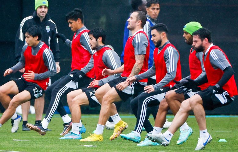 Seattle Sounders FC players run through a drill during practice Saturday, Jan. 7, 2023. 222682 222682