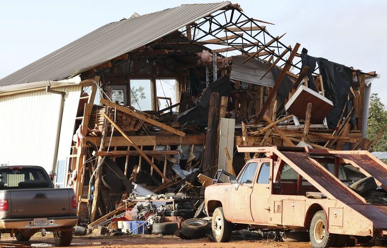 A damaged home is seen in the aftermath of severe weather, Thursday, Jan. 12, 2023, near Prattville, Ala. A large tornado damaged homes and uprooted trees in Alabama on Thursday as a powerful storm system pushed through the South. (AP Photo/Vasha Hunt) ALVH202 ALVH202