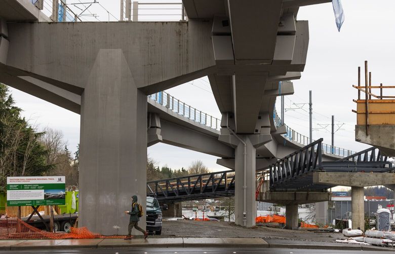A new pedestrian bridge is under construction to the future Wilburton light-rail station, Thursday, Jan. 12, 2023 in Bellevue.