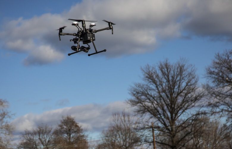 FILE — A drone operating in the Queens borough of New York, on Dec. 4, 2018. A newly released declassified report on unidentified sightings reported to the military or intelligence agencies found a majority have ordinary explanations, though dozens remain officially unexplained. (Uli Seit/The New York Times) XNYT130 XNYT130