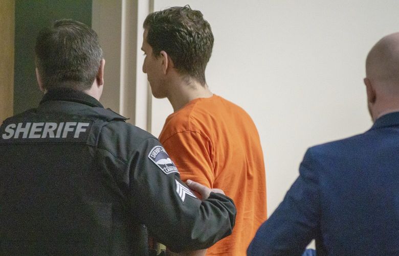 Accused murderer Bryan Kohberger is led out of Latah County District Court in Moscow, Idaho on Thursday, Jan. 12, 2023, after a status hearing. Kohberger waived his right to a quick preliminary hearing, agreeing to have it on June 26, 2023. (Kai Eiselein/New York Post via AP, Pool) NYNYP404 NYNYP404