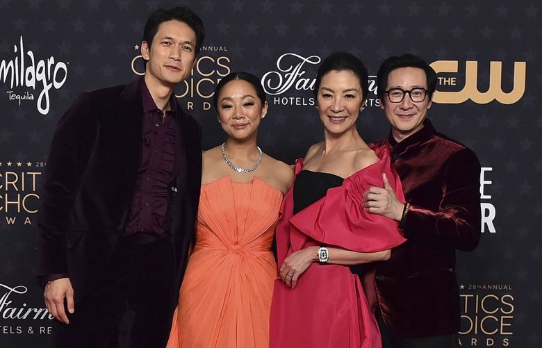 Harry Shum Jr., from left, Stephanie Hsu, Michelle Yeoh and Ke Huy Quan, winners of best picture for “Everything Everywhere All at Once,” pose in the press room at the 28th annual Critics Choice Awards at The Fairmont Century Plaza Hotel on Sunday, Jan. 15, 2023, in Los Angeles. Ke Huy Quan, right, won the award for best supporting actor for “Everything Everywhere All at Once.” (Photo by Jordan Strauss/Invision/AP) CADA1174 CADA1174
