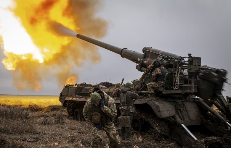 FILE — Ukrainian artillerymen fire a 2S7 Pion cannon toward Russian fortifications inside the city of Kreminna, Ukraine on Dec. 31, 2022. The Pentagon is tapping into a vast but little-known stockpile of American ammunition in Israel to help meet Ukraine’s dire need for artillery shells in the war with Russia (Nicole Tung/The New York Times)