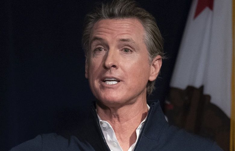 California Gov. Gavin Newsom delivers his budget proposal in Sacramento, Calif., Tuesday, Jan. 10, 2023. California faces a projected budget deficit of $22.5 billion for the coming fiscal year, Newsom announced Tuesday, just days into his second term. It’s a sharp turnaround from last year’s $98 billion surplus. (AP Photo/José Luis Villegas) CAJL208 CAJL208